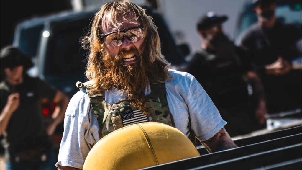 Man Carries Sandbag One Mile!